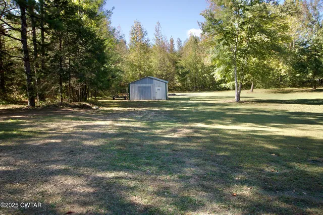 a view of two chairs in the balcony