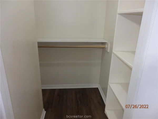 a view of small space with racks on the wall