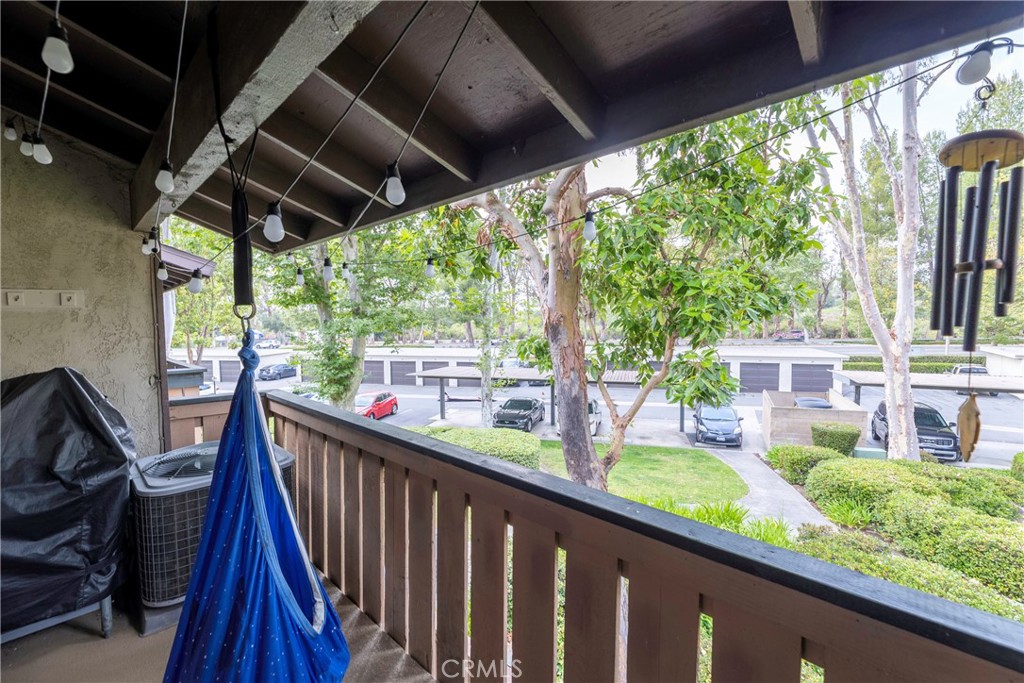 20702 El Toro Road, Unit 178 Lake Forest, CA 92630 - Photo 17 of 30 a view of a porch with furniture and backyard