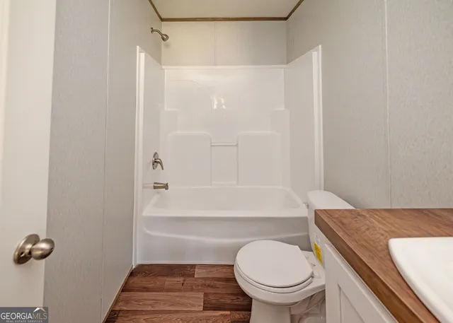 a bathroom with a sink and a toilet