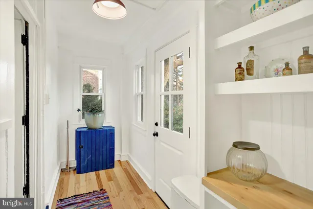 a view of entryway with wooden floor
