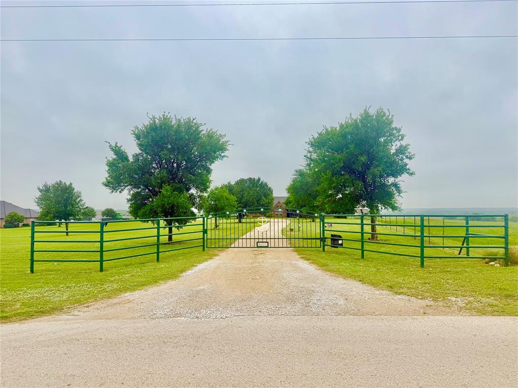WELCOME HOME TO 14717 BURNS BRANCH NESTLED ON 10 ACRES WITH SOME OF BEST VIEWS OF DENTON COUNTY!