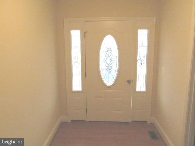 Woodward Lane Rixeyville, VA 22737 - Photo 12 of 19 an empty room with window and mirror