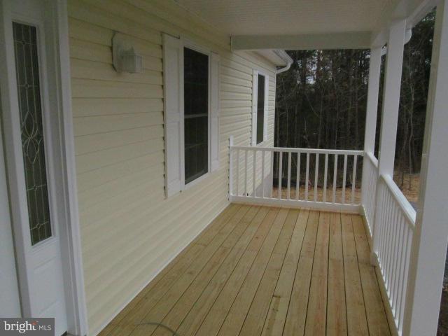 Woodward Lane Rixeyville, VA 22737 - Photo 14 of 19 a view of balcony with wooden floor
