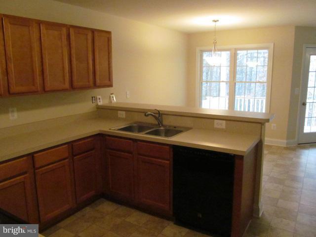 Woodward Lane Rixeyville, VA 22737 - Photo 3 of 19 a kitchen with a sink and cabinets