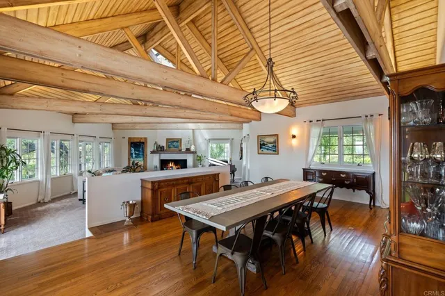 a kitchen with stainless steel appliances granite countertop a sink and a refrigerator