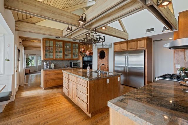 a bedroom with a bed furniture and a book shelf