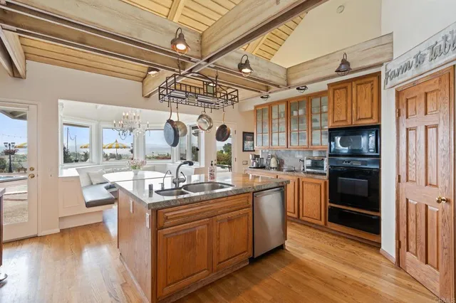 a bedroom with bed and glass door