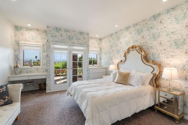 a view of a lake from a balcony