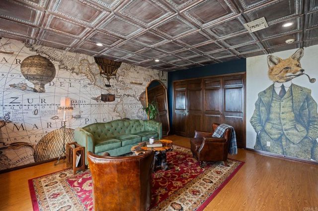 a kitchen with stainless steel appliances granite countertop a refrigerator a stove and a sink with granite countertops