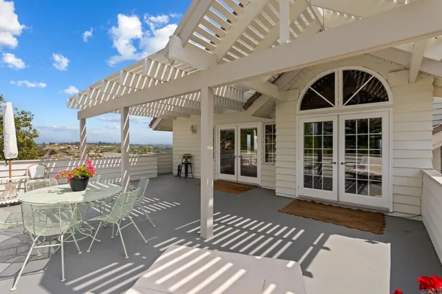 a bathroom with a sink double vanity and a mirror