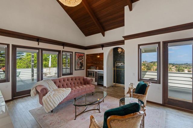 a bathroom with a sink a vanity and a mirror