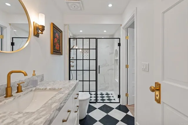 a view of a swimming pool with a patio and a yard