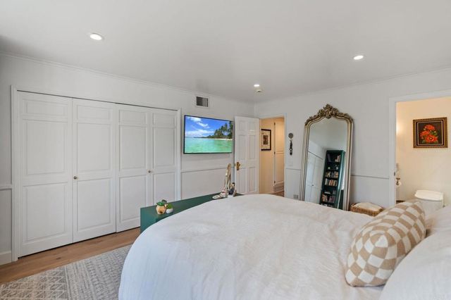 a view of a patio with swimming pool table and chairs
