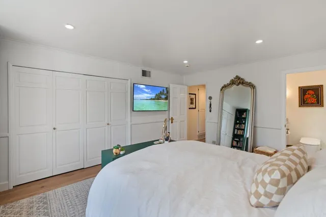 a view of a patio with swimming pool table and chairs