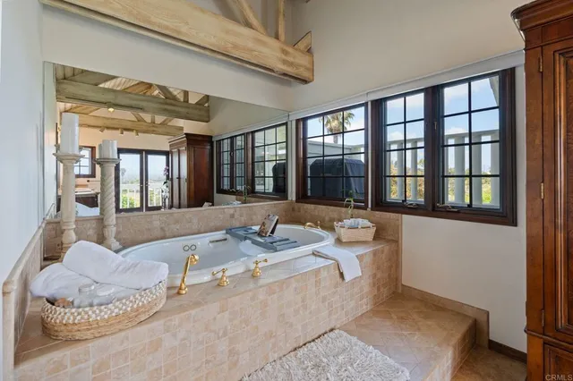 an aerial view of residential house with outdoor space and trees