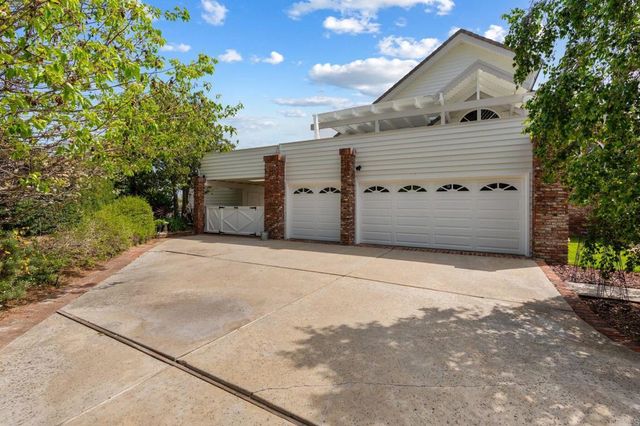 a view of a livingroom with furniture and window