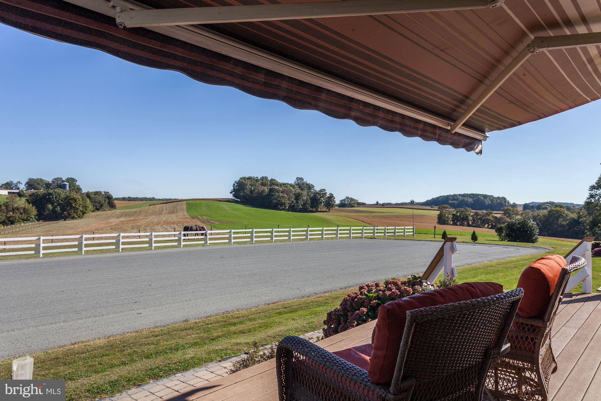 3517 Burkins Road Street, MD 21154 - Photo 18 of 30 MAINTENANCE FREE DECK WITH RETRACTABLE AWNING