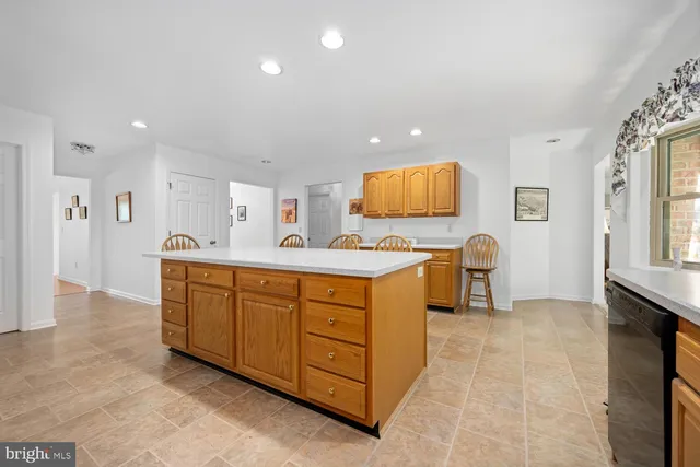 a bedroom with furniture and a flat screen tv