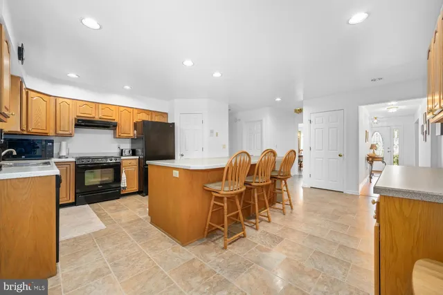 a living room with furniture fireplace and a flat screen tv