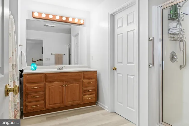 a bedroom with a bed and a cabinets