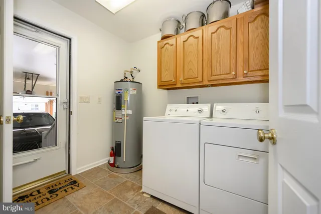 a view of a dining room with furniture and a livingroom