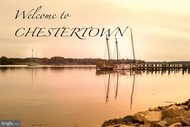 a couple of cars parked in front of a building