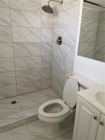 a view of room and wooden floor