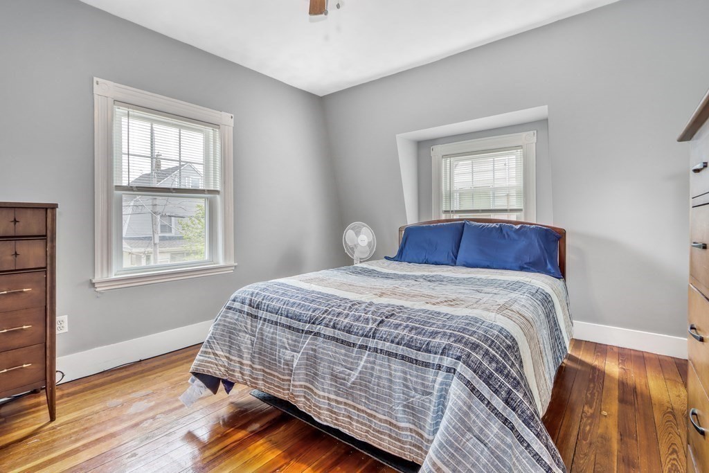 24 Baker Road Everett, MA 02149 - Photo 17 of 26 a bedroom with bed and window