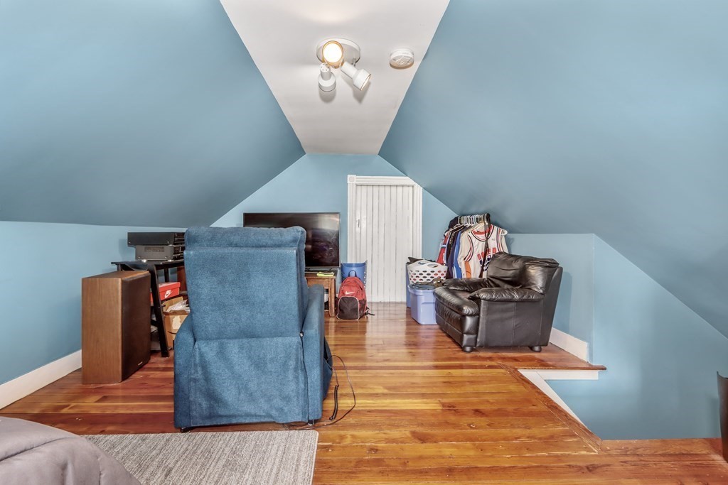 24 Baker Road Everett, MA 02149 - Photo 22 of 26 view of living room with furniture and wooden floor