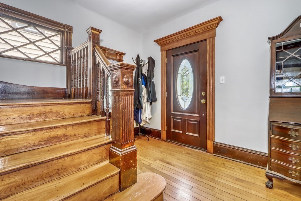 24 Baker Road Everett, MA 02149 - Photo 5 of 26 a view of an entryway with wooden floor