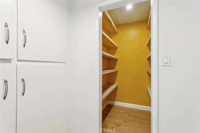 a view of hallway with closet