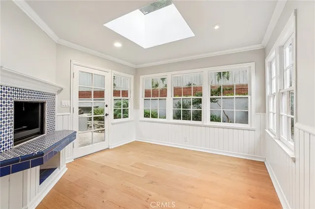 a bathroom with a sink mirror and toilet