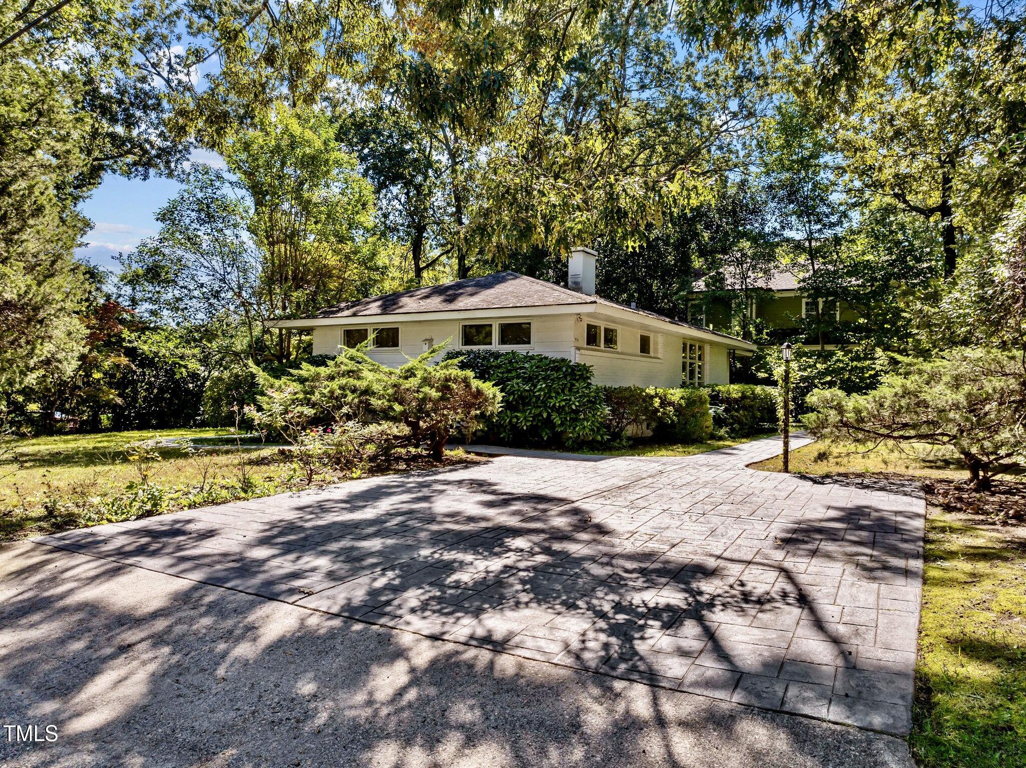 1510 Ridge Road Raleigh, NC 27607 - Photo 11 of 55 a house with swimming pool in front of it