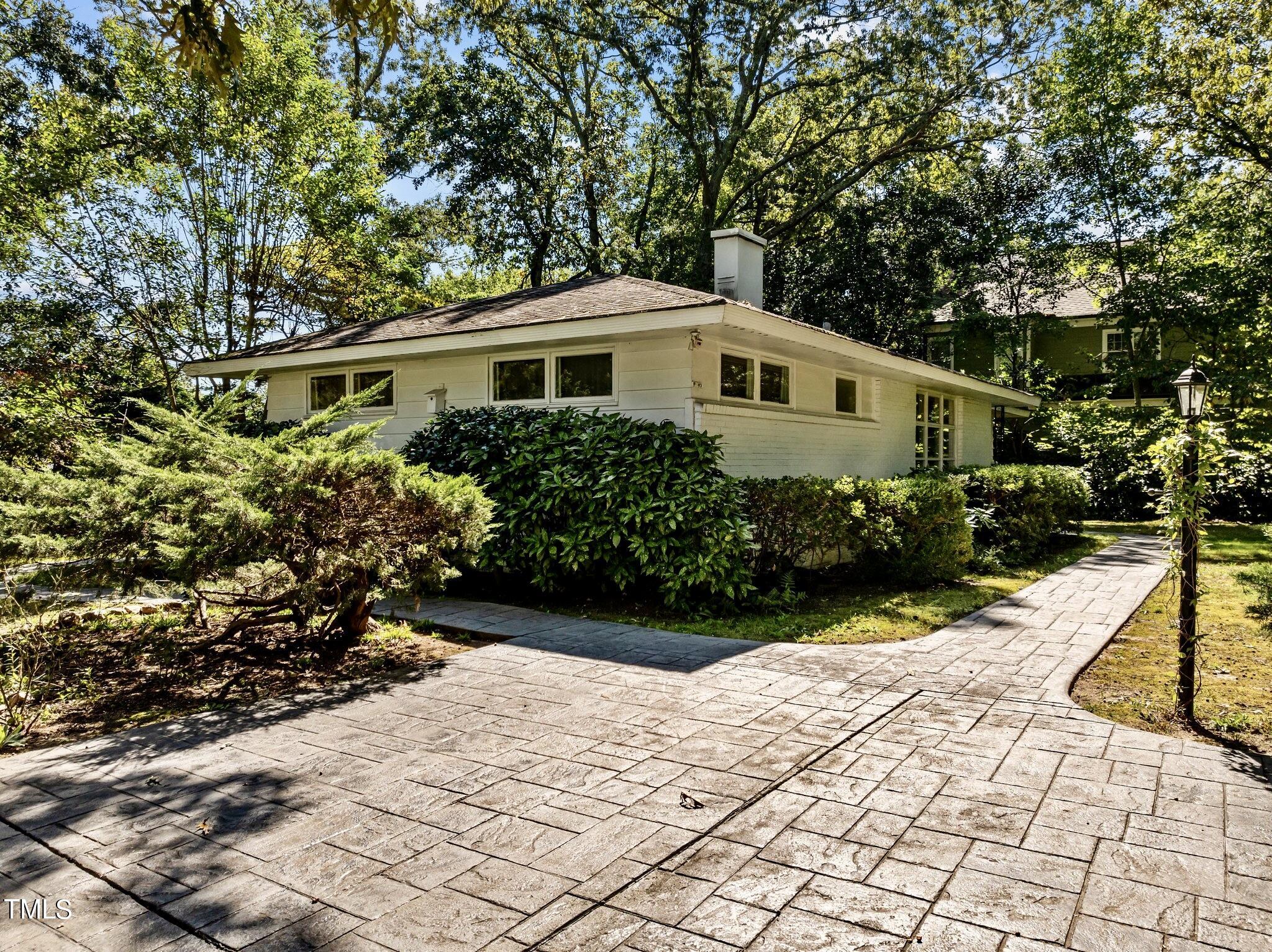 1510 Ridge Road Raleigh, NC 27607 - Photo 12 of 55 a front view of a house with a yard