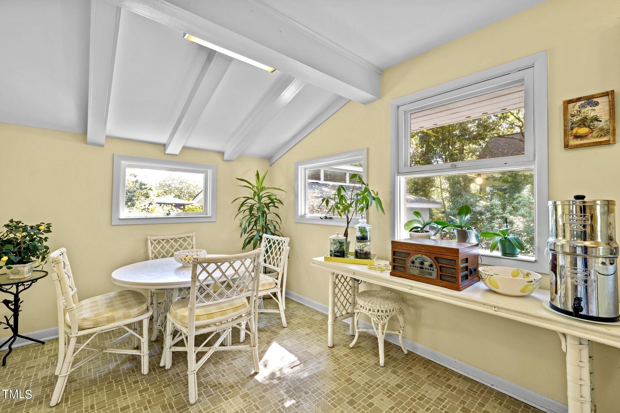 1510 Ridge Road Raleigh, NC 27607 - Photo 22 of 55 a dining room with furniture and window