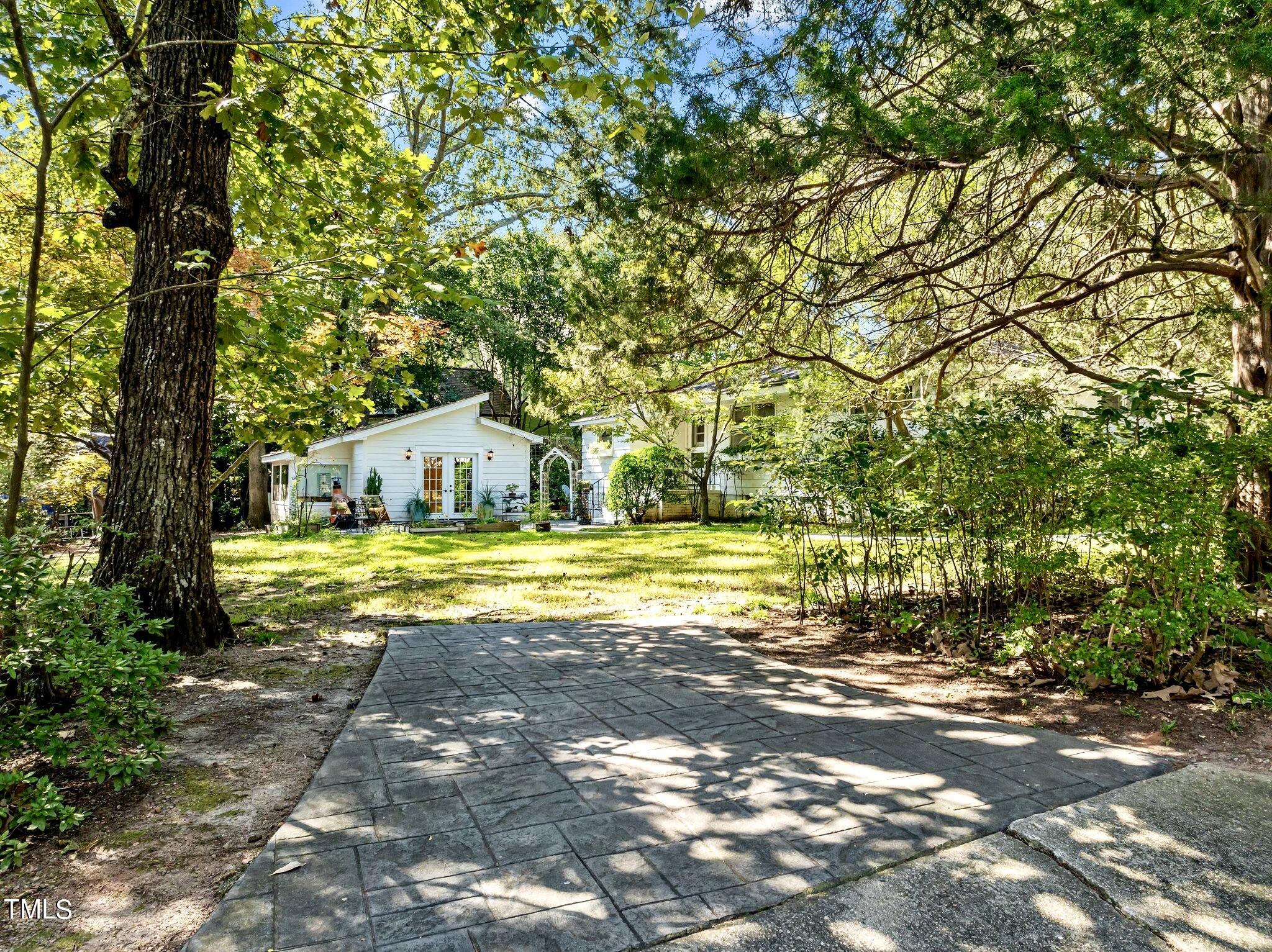 1510 Ridge Road Raleigh, NC 27607 - Photo 4 of 55 a view of a swimming pool with an outdoor space