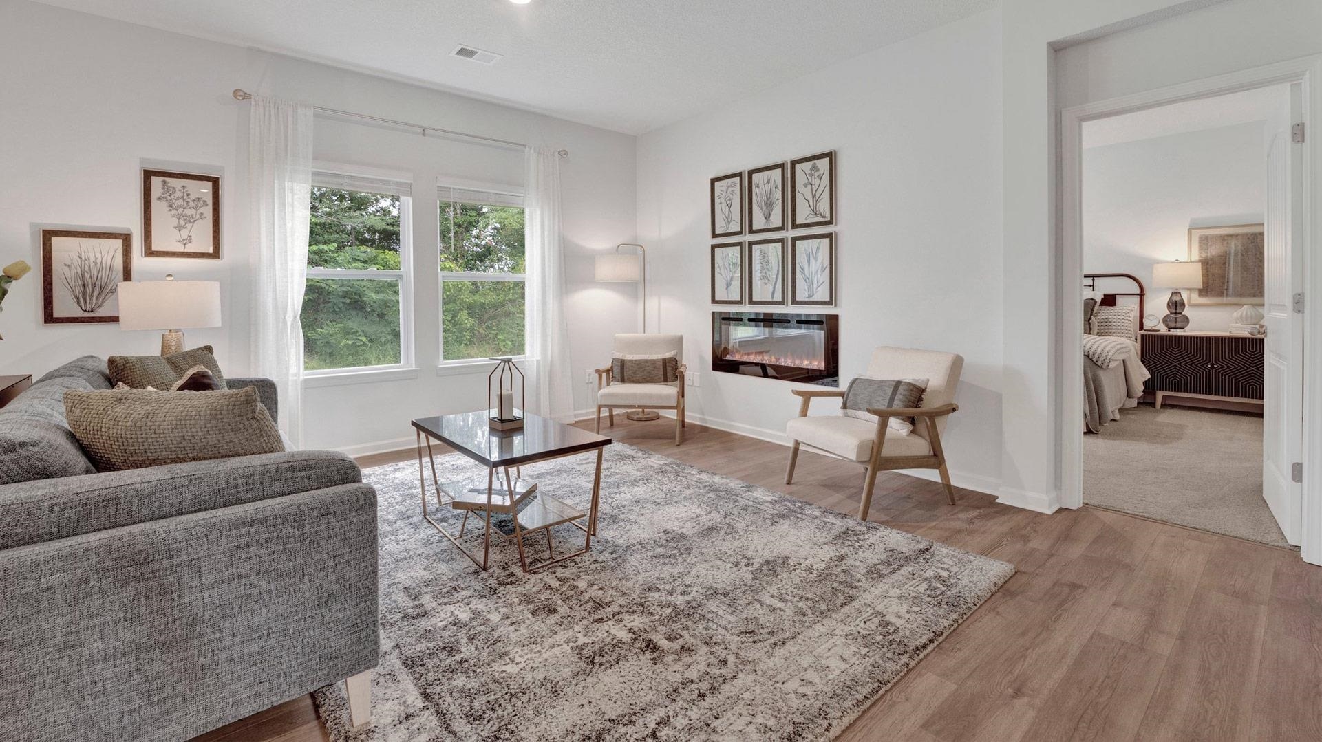 430 Windemere Loop Oakland, TN 38060 - Photo 15 of 28 a living room with furniture and a large window