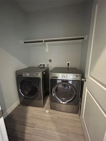 a close view of a sink and cabinets