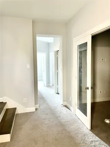 an empty room and a glass door