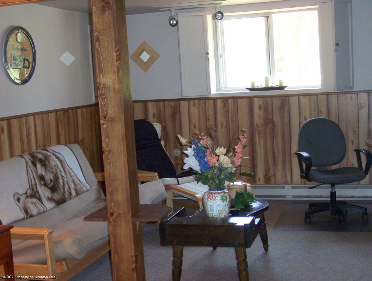 4 Rr Road Lake Ariel, PA 18436 - Photo 11 of 12 a living room with furniture and a potted plant