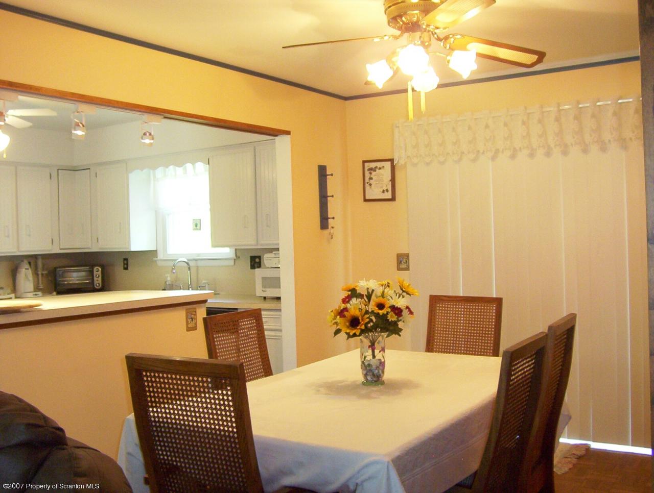 4 Rr Road Lake Ariel, PA 18436 - Photo 5 of 12 a view of a dining room with furniture and wooden floor