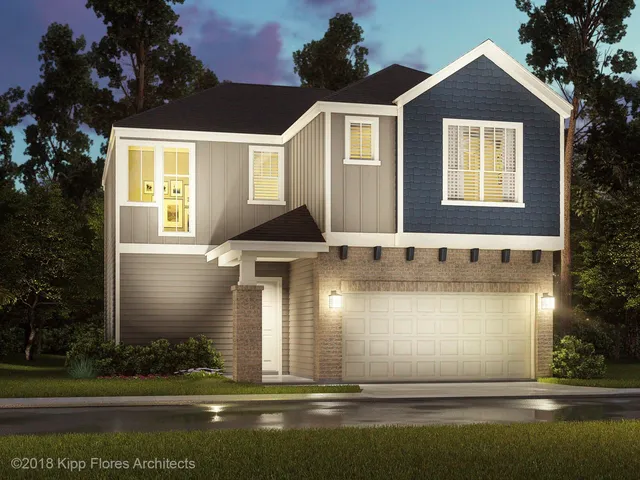 a front view of a house with yard