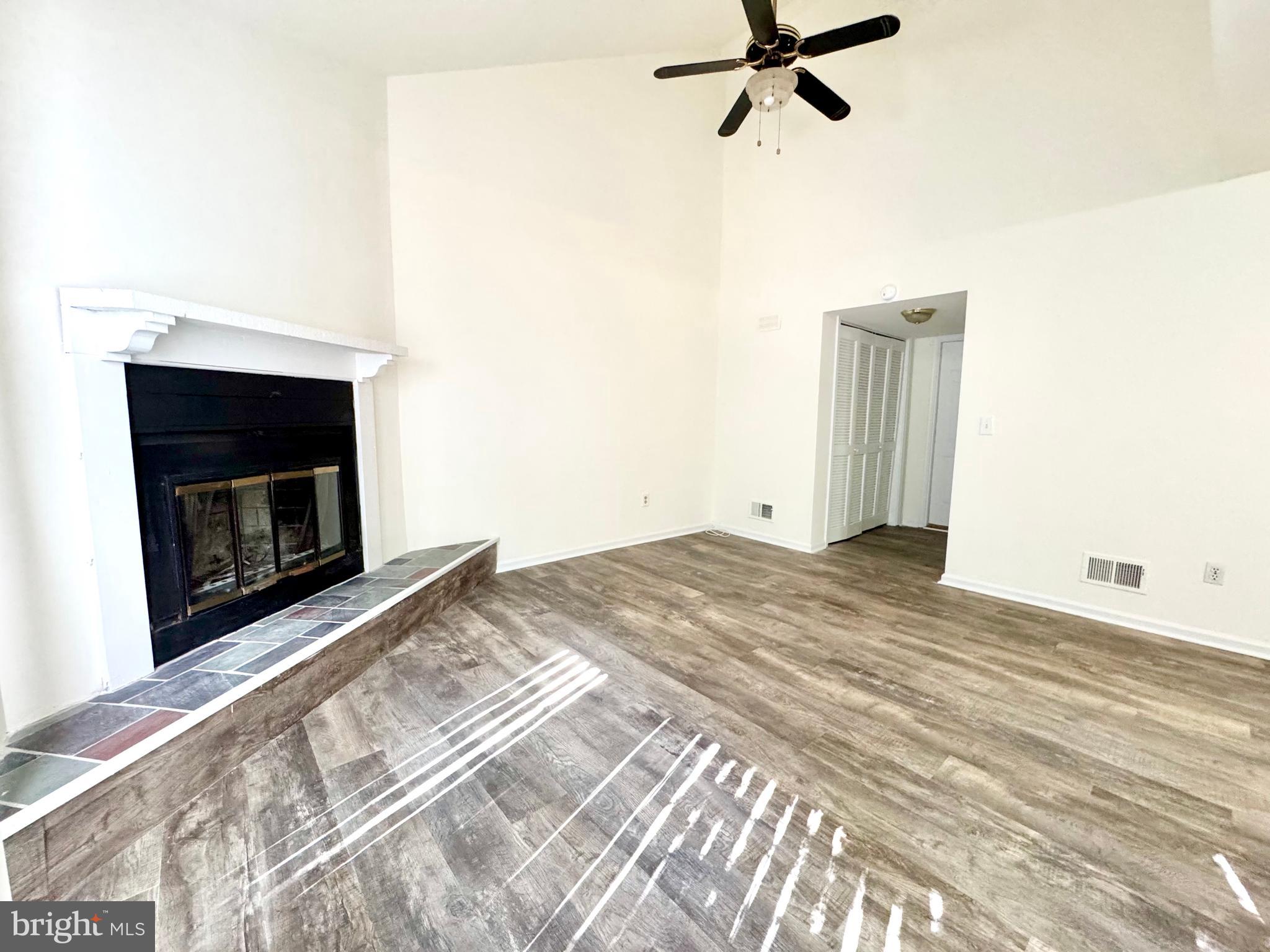 271 Pine Valley Road Dover, DE 19904 - Photo 14 of 24 a bedroom with a bed and a fireplace