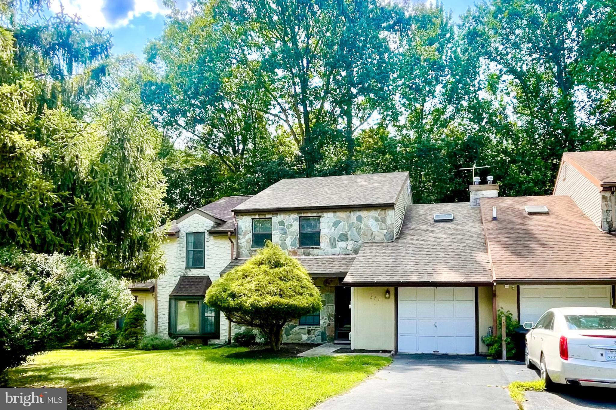 271 Pine Valley Road Dover, DE 19904 - Photo 2 of 24 a front view of a house with a garden and porch