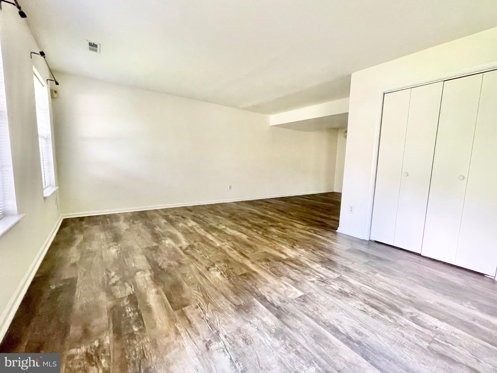 271 Pine Valley Road Dover, DE 19904 - Photo 6 of 24 wooden floor in an empty room
