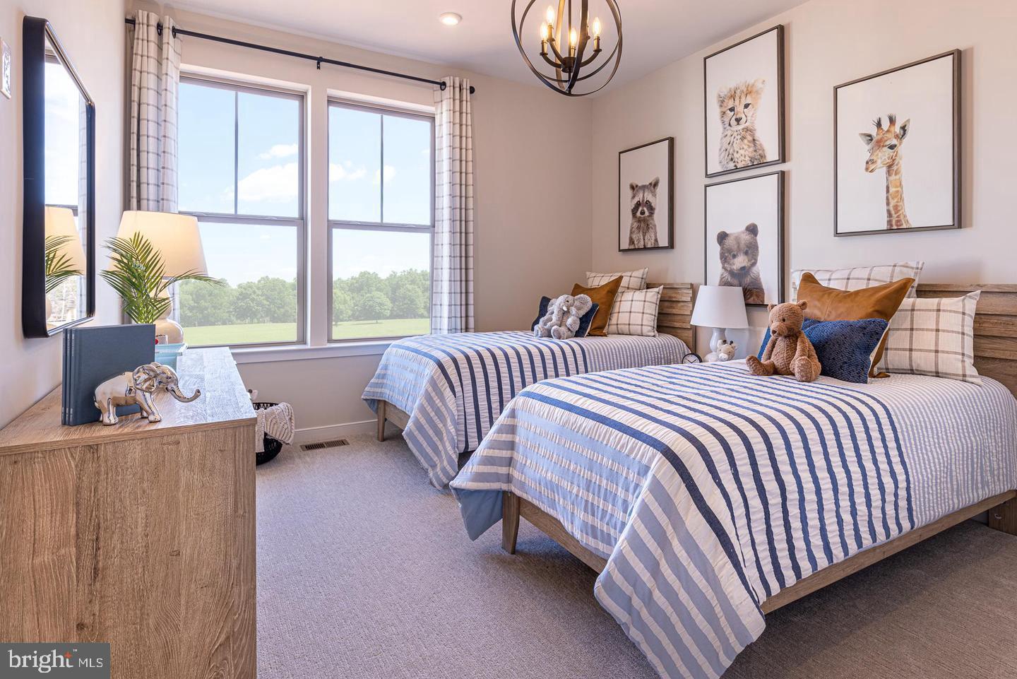 20957 Bluebird Square Sterling, VA 20165 - Photo 7 of 18 a bedroom with two beds and a large window