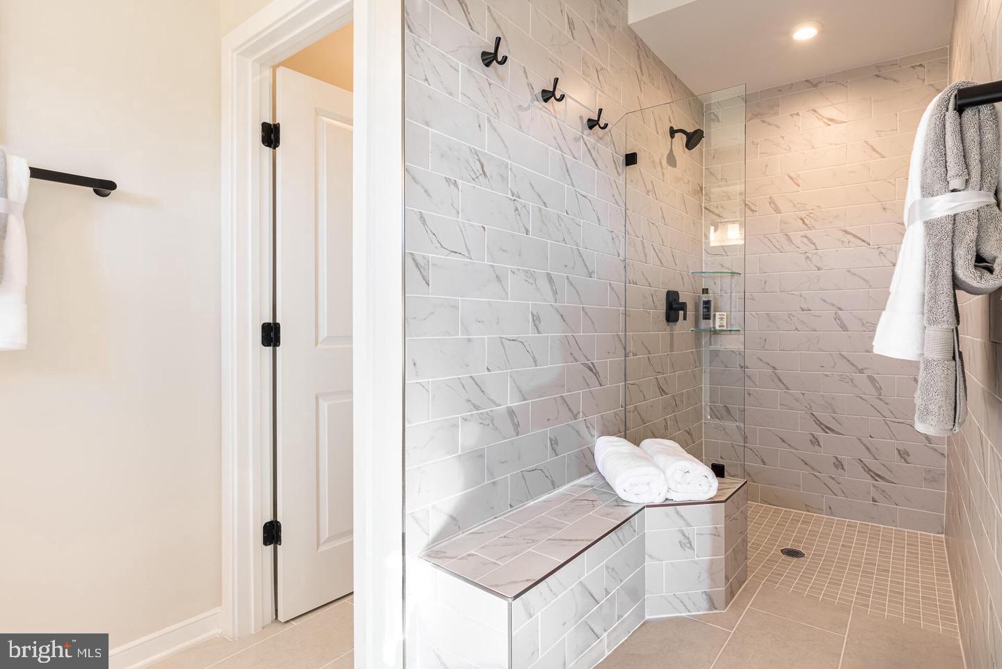 20957 Bluebird Square Sterling, VA 20165 - Photo 10 of 18 a bathroom with a shower