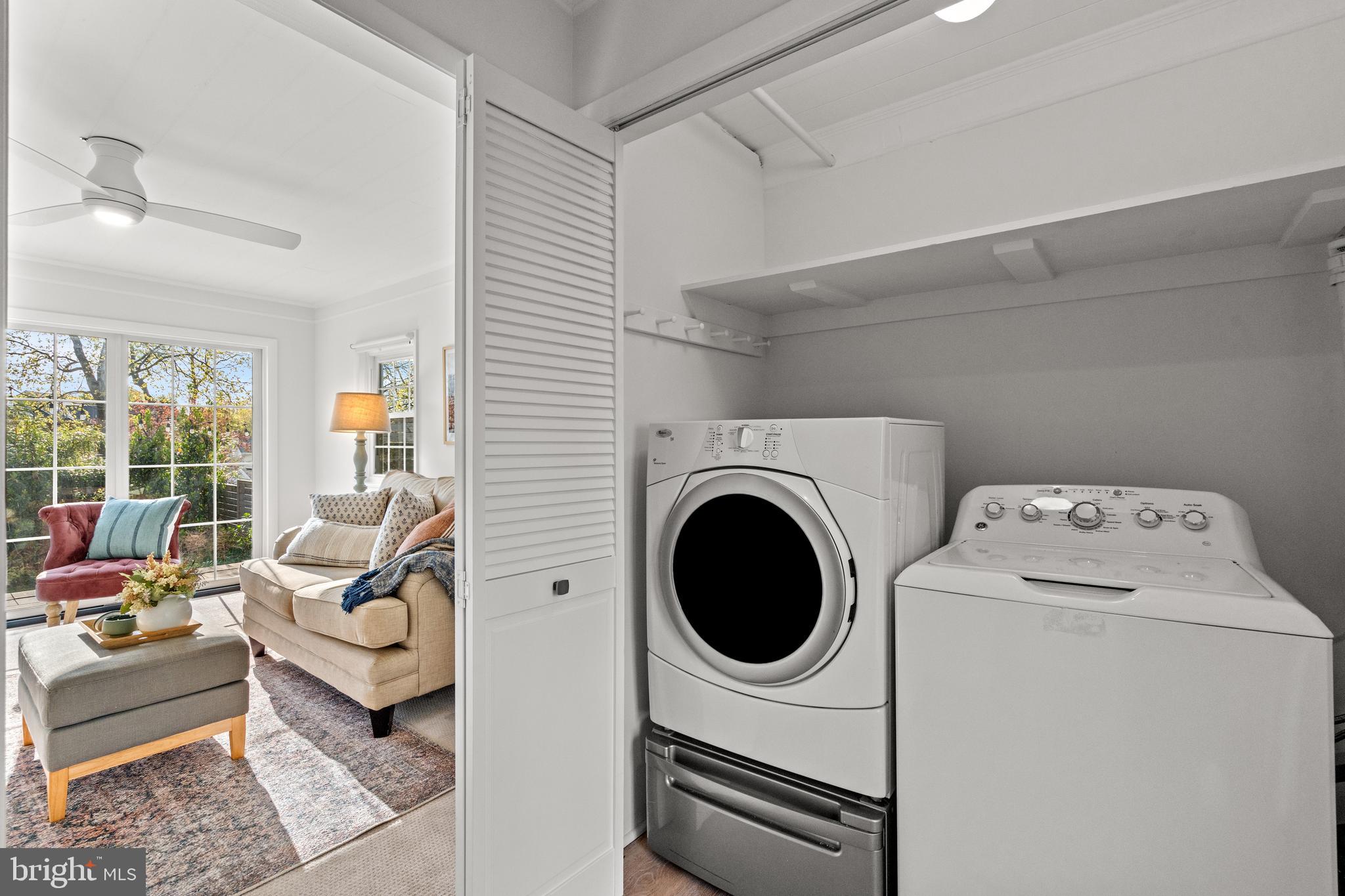 6219 Arkendale Road Alexandria, VA 22307 - Photo 16 of 33 a living room with furniture a large window and a fireplace