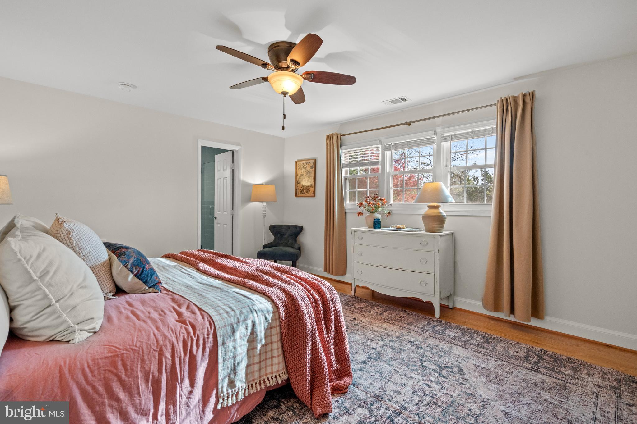6219 Arkendale Road Alexandria, VA 22307 - Photo 18 of 33 a bedroom with a bed and a chandelier